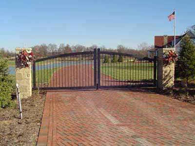 Custom fabricated entry gate with electronic opener